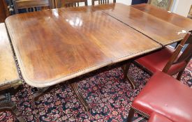 A Victorian mahogany twin-pillar dining table (one additional leaf) 150cm. extended