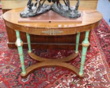 An Empire style oval painted gilt metal mounted mahogany centre table W.108cm