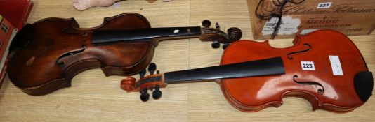 A late 19th century violin supplied by Thompson Wembley and one other violin
