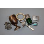 A quantity of mixed silver to include an egg cup, rattle, snuff box, salts bottle, etc.