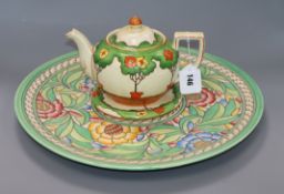 A Charlotte Rhead charger and a Burleighware teapot