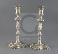 A pair of early Victorian silver candlesticks, by Henry Wilkinson & Co, with waisted, knopped stems,