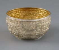 An Indian Lucknow silver small bowl, embossed with scrolling foliage, foliate mark to base,