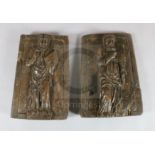 A pair of 18th century Continental carved wood panels, depicting saints, W.12in. H.16.5in.