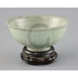 A Chinese Longquan celadon bowl, Ming dynasty, with burnt orange ring to the base, D. 18.5cm,