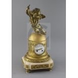 A late 19th century French ormolu mantel clock, surmounted with a figure of Cupid holding grapes,