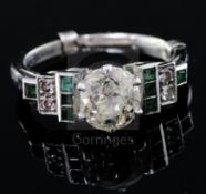 An Art Deco 18ct white gold, platinum and single stone diamond ring, with square cut emerald and