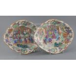 A pair of Chinese famille rose dishes, Daoguang period (1821-50), of lozenge form, each painted with