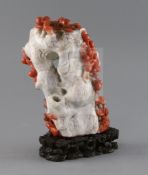 A Chinese chalcedony vase, in imitation of coral, skillfully carved to the contrasting coral red and