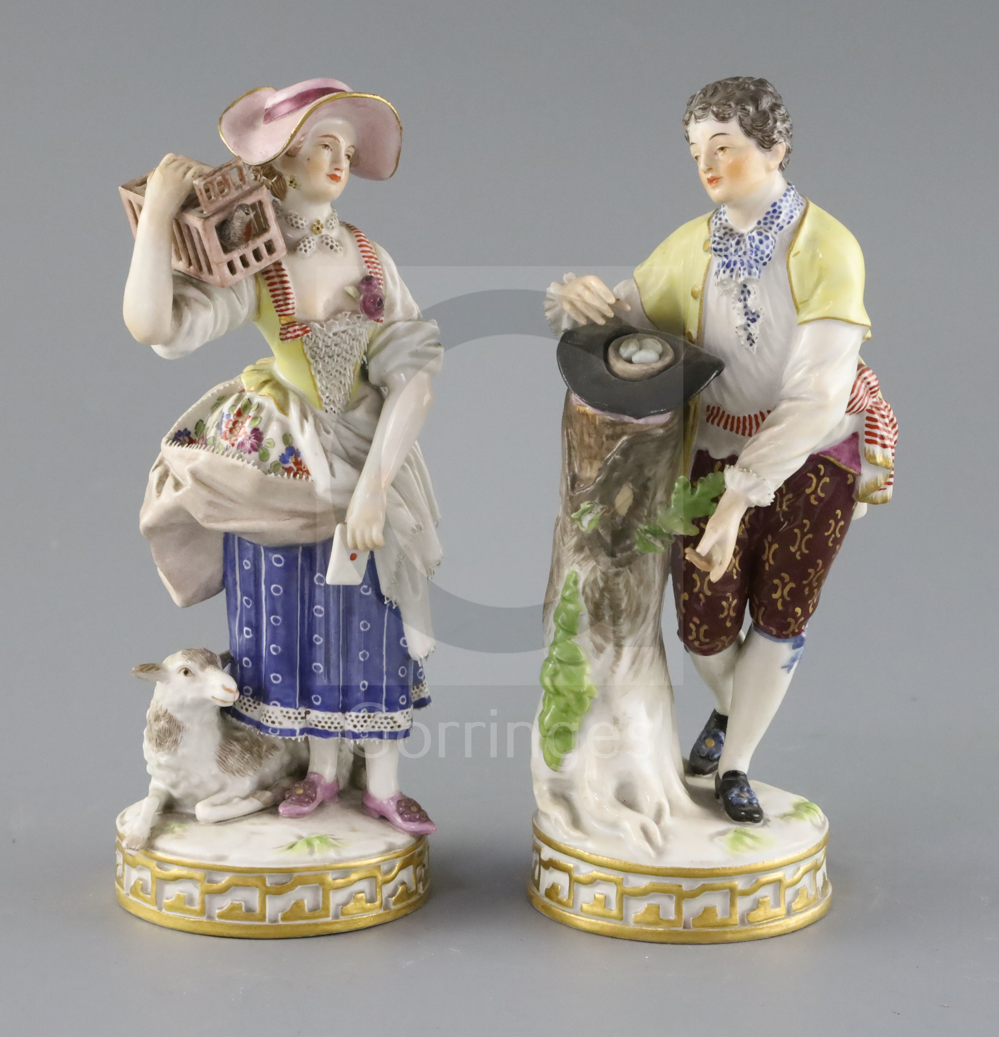 Two Meissen figures of a boy with a bird nest and girl with a bird cage, late 19th century, each