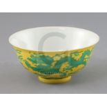 A Chinese yellow ground 'dragon' bowl, probably Qianlong mark and period, with incised green dragons