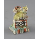 A Chinese enamelled porcelain 'cat' joss-stick holder, 18th century, H. 7cmEx. John Hilliard