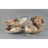 A Coalport thirty six piece Imari pattern dessert service, c.1810-15, each piece painted to the