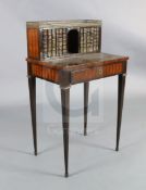 An early 19th century French rosewood and parquetry bonheur du jour, with marble topped brass