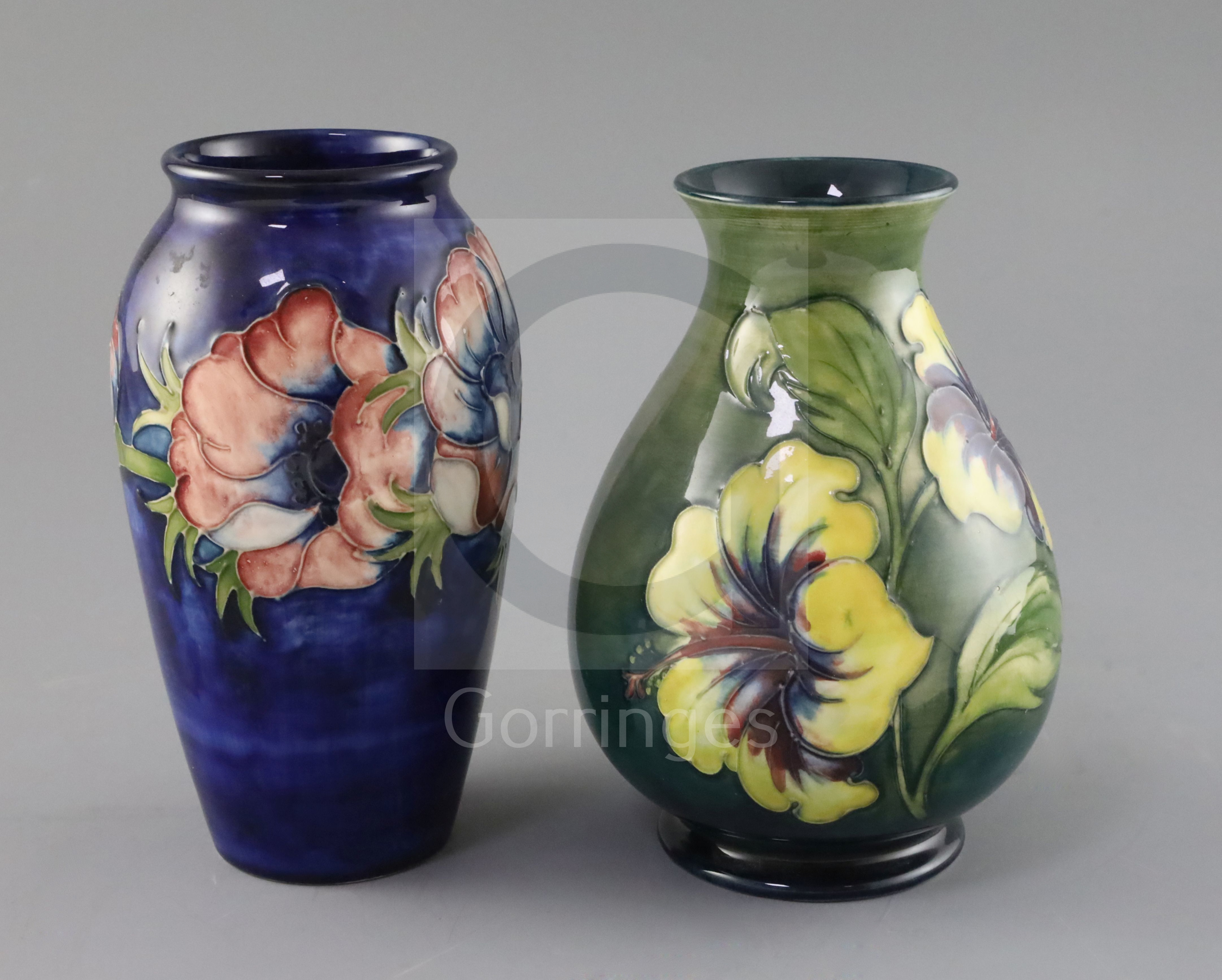 A Moorcroft 'anemone' vase and a similar 'hibiscus' vase, 1950/60's, impressed marks Moorcroft,