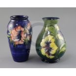 A Moorcroft 'anemone' vase and a similar 'hibiscus' vase, 1950/60's, impressed marks Moorcroft,