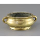 A good Chinese polished bronze censer, gui, 17th/18th century, applied with a pair of lug handles,