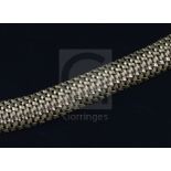 A stylish 14k gold interwoven link demi-lune bracelet, 20cm.