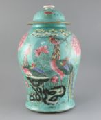 A large Chinese turquoise ground 'phoenix' vase and cover, 18th/19th century, painted in famille