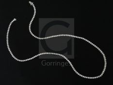 An Italian 18ct white gold and diamond line necklace, set with one hundred and sixty two round cut