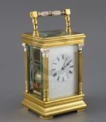 An early 20th century French gilt brass quarter-repeating carriage clock, striking on two gongs,
