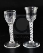 Two double series opaque twist stem cordial glasses, c.1760, each with a fluted bowl and conical