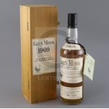 A bottle of Glen Mhor 1969 single Highland malt whisky, no. 518 off 2265, in wooden presentation