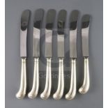 A modern set of twelve silver pistol handled table knives and a similar set of dessert knives, by