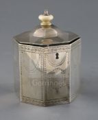 A George III silver octagonal tea caddy by William Turton, with turned ivory finial, engraved