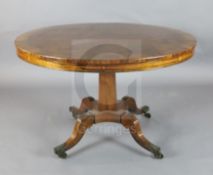 A Regency brass strung rosewood breakfast table, with circular tilt top, inlaid to the frieze with