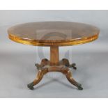 A Regency brass strung rosewood breakfast table, with circular tilt top, inlaid to the frieze with