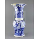 A Chinese blue and white yen-yen vase, Kangxi period, painted with mythical beasts standing on rocks