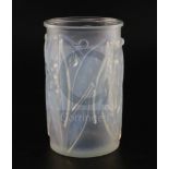 A Rene Lalique 'Laurier' clear and opalescent glass vase, No. 947, incised mark to edge 'R.