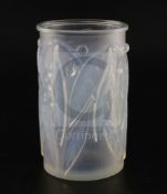 A Rene Lalique 'Laurier' clear and opalescent glass vase, No. 947, incised mark to edge 'R.