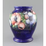 A Moorcroft 'anemone' ovoid vase, 1930/40's, with a cobalt blue ground, impressed mark W.