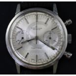 A gentlemans 1960's stainless steel Breitling Top Time manual wind wrist watch, the silvered dial