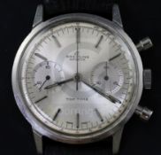 A gentlemans 1960's stainless steel Breitling Top Time manual wind wrist watch, the silvered dial