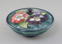 A Moorcroft 'clematis' powder bowl and cover, 1930/40's, impressed mark W. Moorcroft Potter to HM