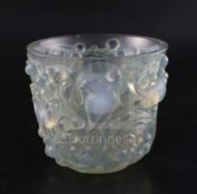 A Rene Lalique 'Avallon' opalescent glass vase, No. 986, with remnants of blue staining, incised