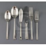 A George VI Art Deco silver canteen of cutlery for twelve, by Cooper Brothers & Sons, comprising one