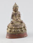 A Chinese lacquered bronze figure of Buddha Shakyamuni, 17th century, seated on a double lotus