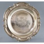 An early Victorian silver shaped circular dish, by Benjamin Smith III, with engraved armorial and