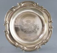 An early Victorian silver shaped circular dish, by Benjamin Smith III, with engraved armorial and