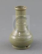 A Chinese celadon bottle vase, H. 15.4cm