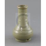 A Chinese celadon bottle vase, H. 15.4cm