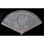 A Chinese export ivory brise fan, late 18th century, pierced and carved in low relief with