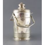 A 20th century Cartier sterling silver double handled ice bucket and cover, of cylindrical form,