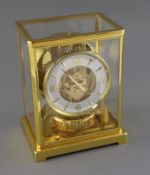 A Jaeger le Coultre Atmos clock, with lacquered gilt case, movement number 377751, H.9in.