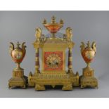 A 19th century French ormolu and porcelain classical revival clock garniture, decorated with