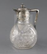 A late Victorian silver mounted cut glass claret jug, Z. Barraclough & Sons, of bulbous for,